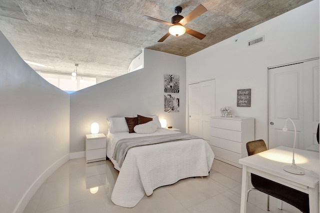 bedroom featuring visible vents, baseboards, and ceiling fan