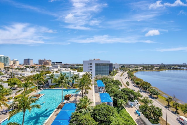 drone / aerial view with a view of city and a water view