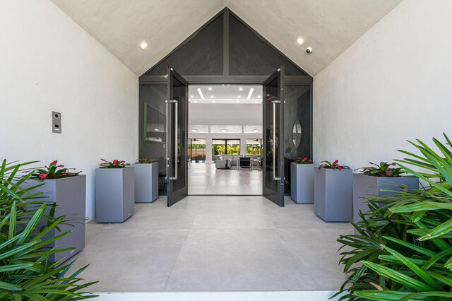 living room featuring visible vents, recessed lighting, high vaulted ceiling, and baseboards