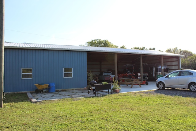 view of parking / parking lot with a pole building