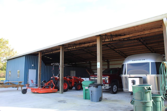 view of parking featuring a carport