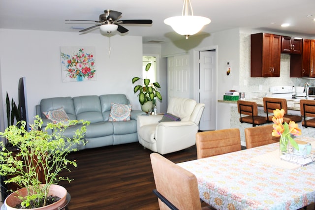 dining room featuring ceiling fan, dark wood-style flooring, and recessed lighting