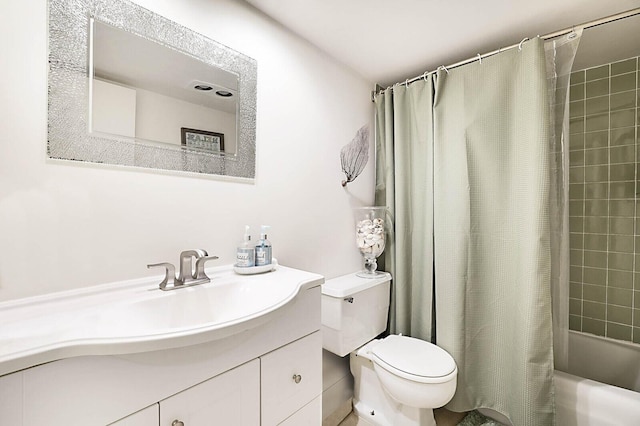 full bathroom with vanity, toilet, and shower / bath combo