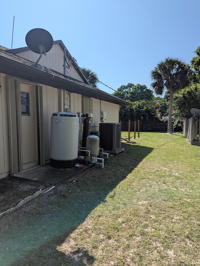 view of yard featuring central air condition unit