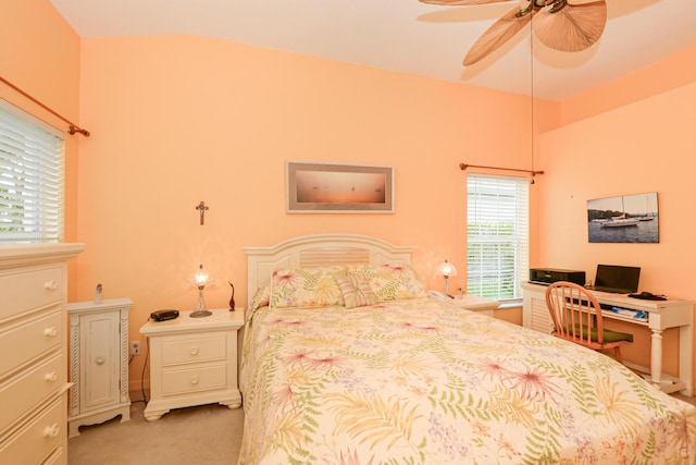 bedroom with a ceiling fan and carpet