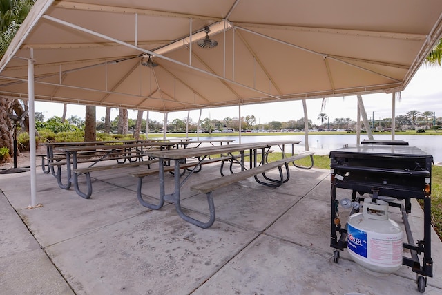 view of community featuring a gazebo and a water view