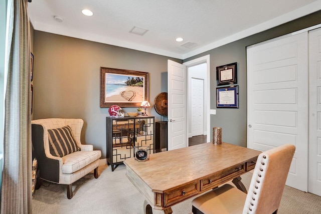 office featuring recessed lighting, light colored carpet, and visible vents