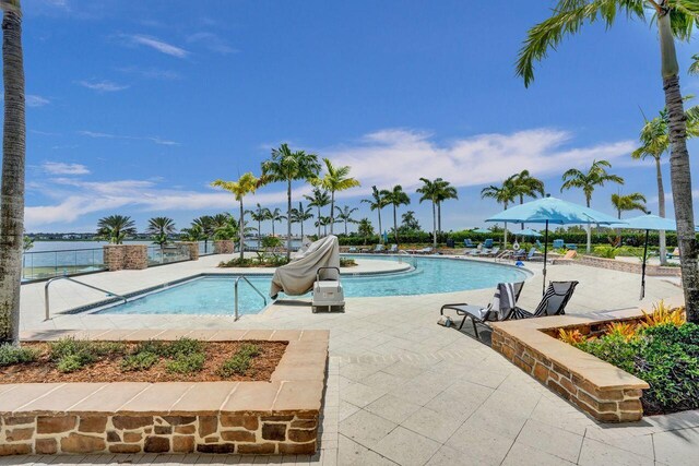 pool featuring a patio area