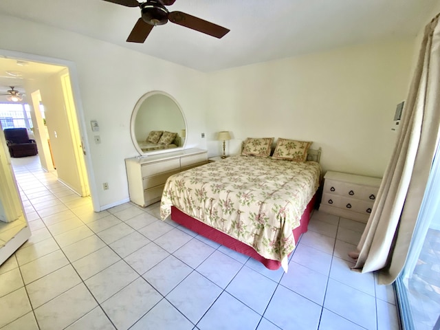 bedroom featuring light tile patterned floors and a ceiling fan