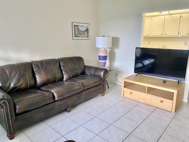 living area featuring light tile patterned floors