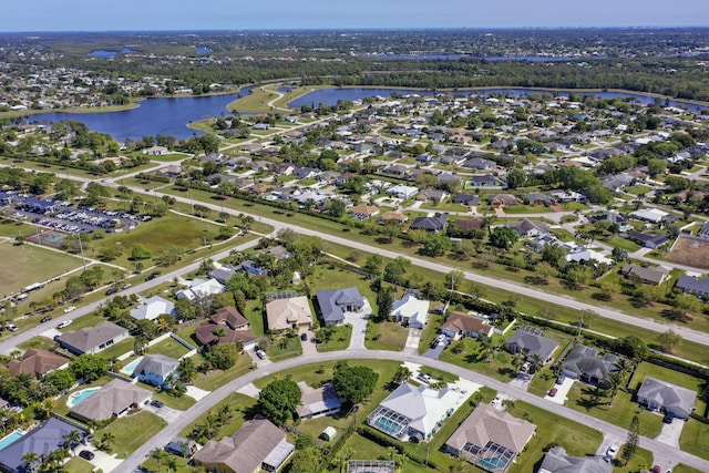 aerial view featuring a water view and a residential view