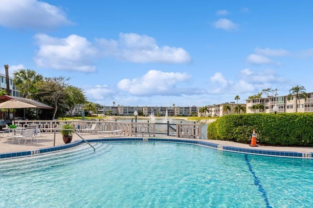 view of swimming pool featuring a patio area