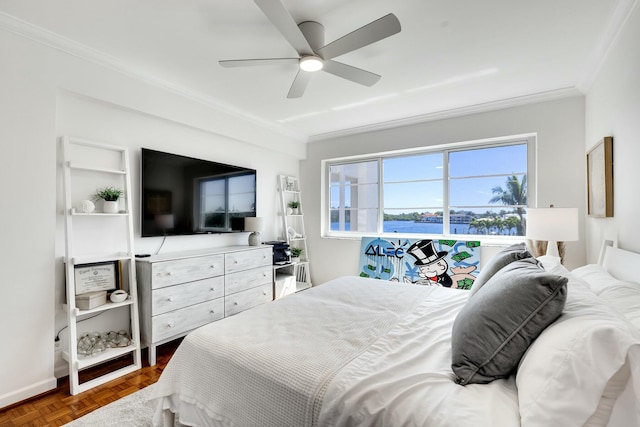 bedroom with a ceiling fan and crown molding