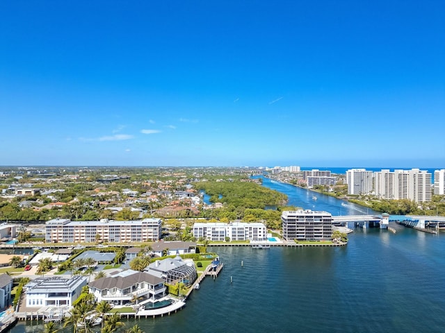 bird's eye view featuring a view of city and a water view