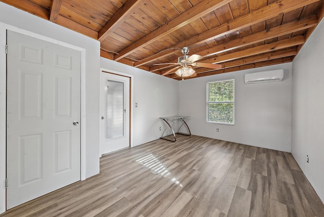 unfurnished bedroom with wooden ceiling, a wall unit AC, and wood finished floors