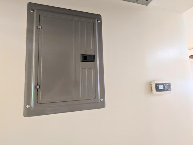 utility room featuring electric panel