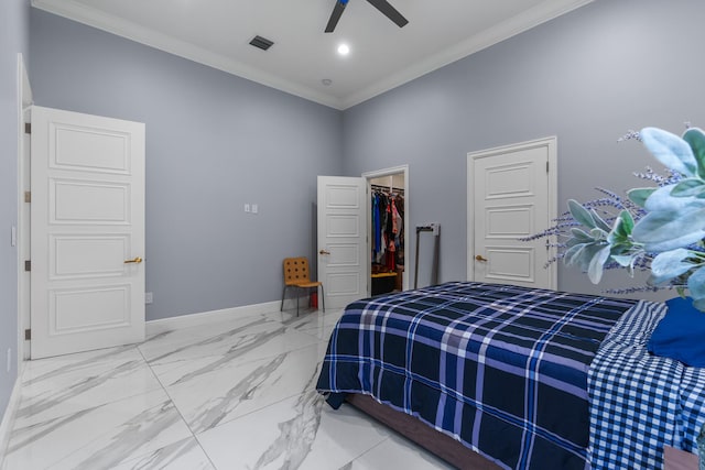 bedroom featuring baseboards, visible vents, a spacious closet, crown molding, and marble finish floor