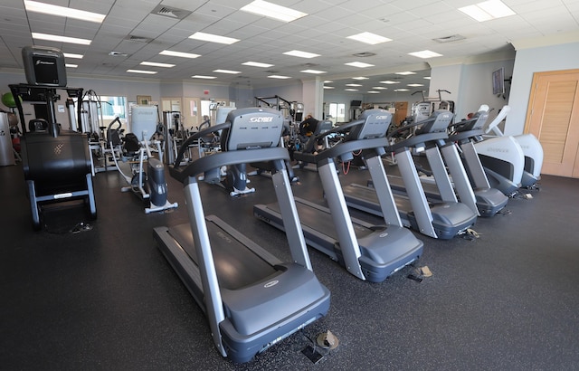 exercise room featuring visible vents and a paneled ceiling