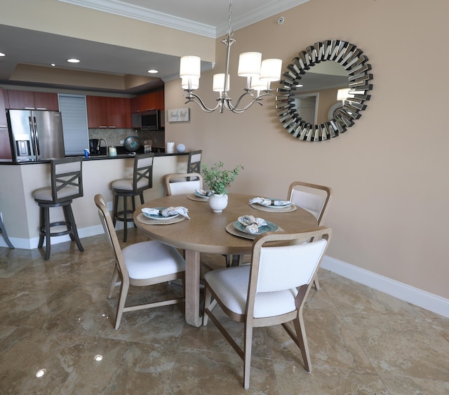 dining space featuring recessed lighting, baseboards, a chandelier, and crown molding