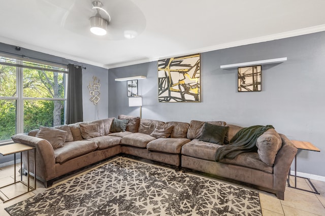 tiled living room featuring crown molding and baseboards