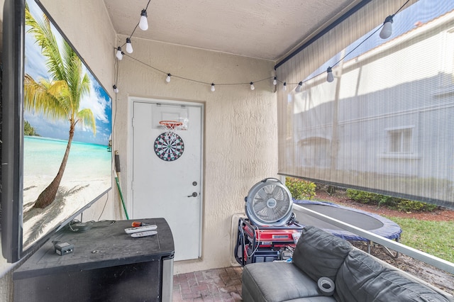 sunroom / solarium featuring plenty of natural light