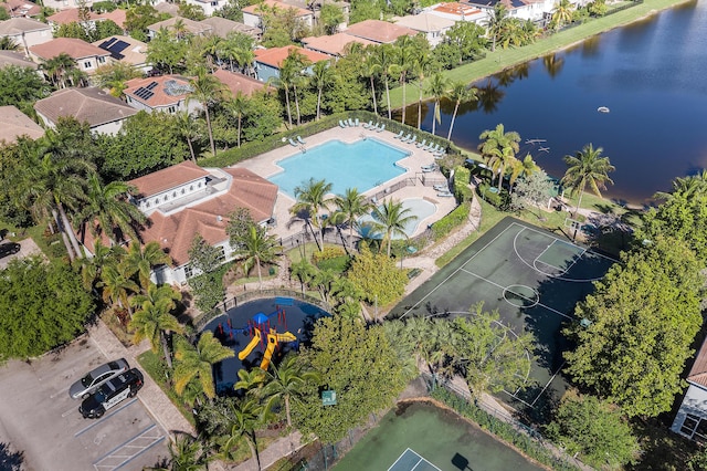 bird's eye view featuring a water view and a residential view