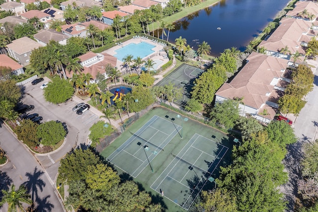 bird's eye view featuring a residential view and a water view