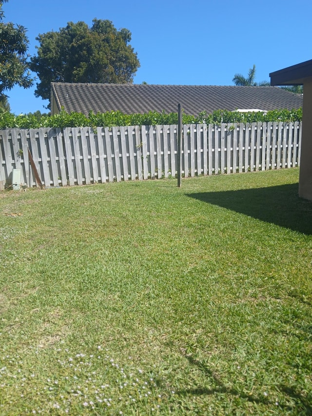 view of yard with fence