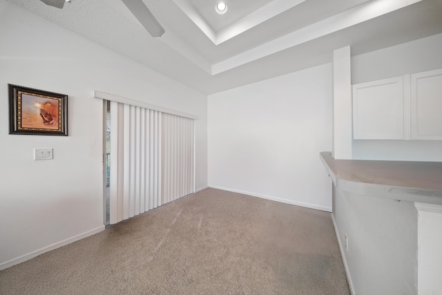 carpeted spare room with recessed lighting and baseboards