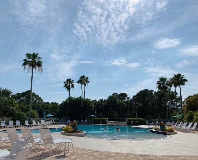 pool with a patio area