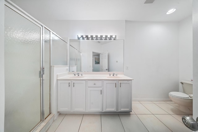 full bathroom featuring tile patterned flooring, a shower stall, double vanity, and a sink