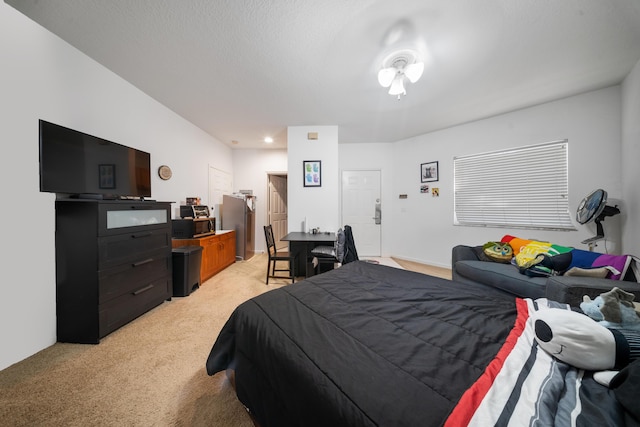 bedroom featuring light colored carpet