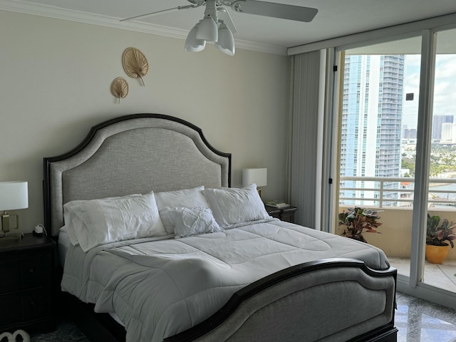 bedroom with a city view, crown molding, and ceiling fan