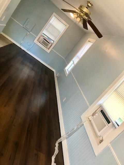 1831 Juno Rd Unit 123, North Palm Beach, FL 33408 - spare room featuring ceiling fan and wood finished floors
