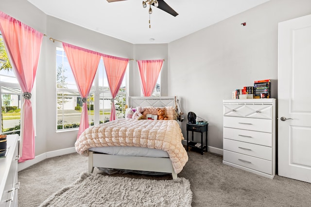 bedroom with baseboards, carpet, and ceiling fan