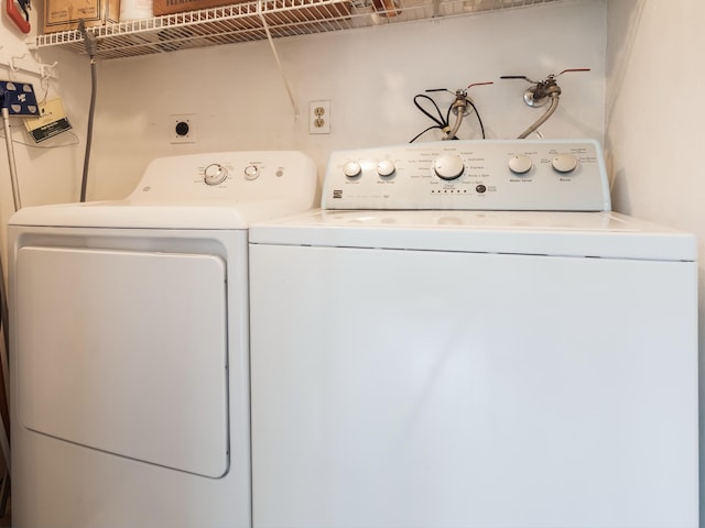 laundry area featuring laundry area and washer and clothes dryer