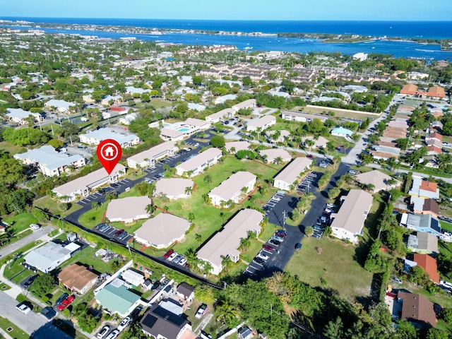 birds eye view of property with a residential view