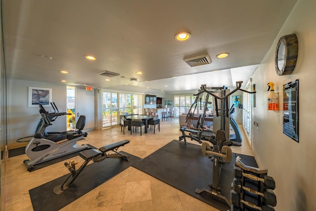 workout area with visible vents and recessed lighting