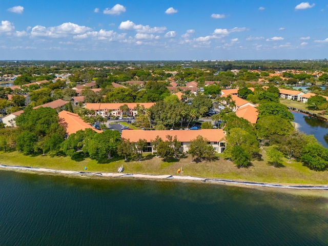 aerial view with a residential view and a water view