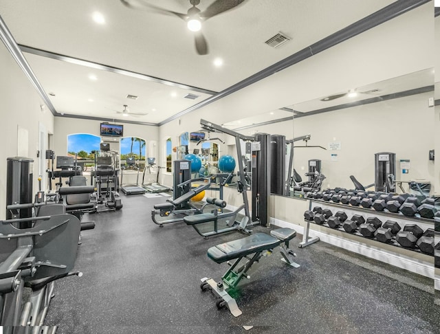 workout area featuring crown molding, visible vents, and ceiling fan