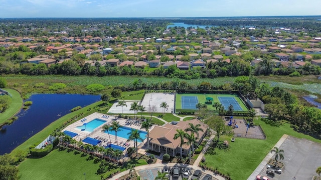 aerial view with a residential view and a water view