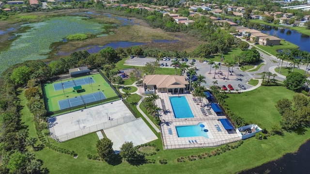 bird's eye view with a water view and a residential view