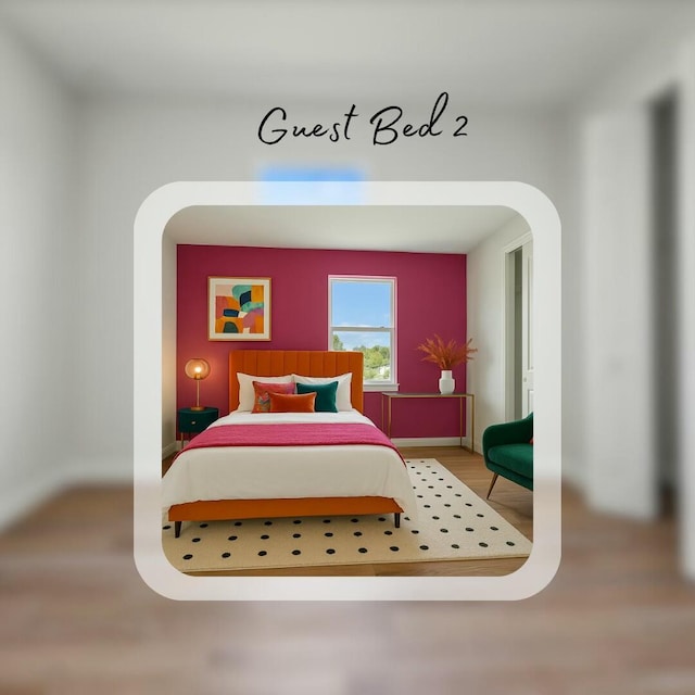 bedroom featuring baseboards, wood finished floors, and arched walkways