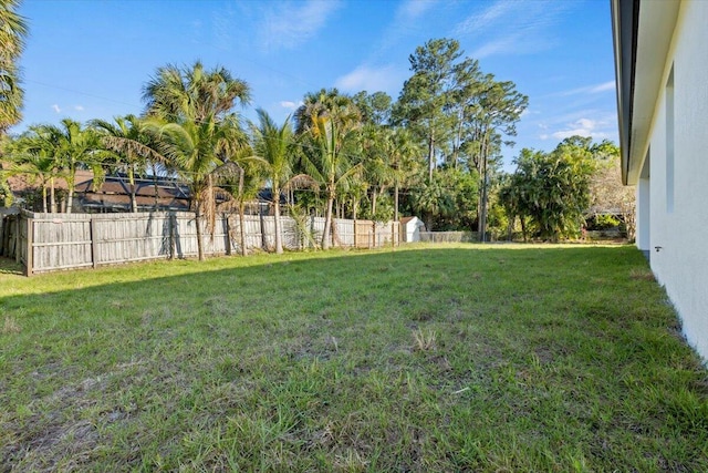 view of yard with fence