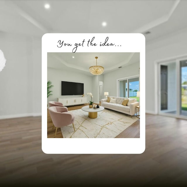 living area featuring recessed lighting, a raised ceiling, wood finished floors, and baseboards