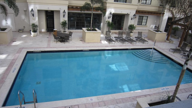 pool featuring a patio