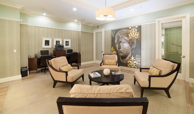 sitting room featuring baseboards, ornamental molding, and recessed lighting