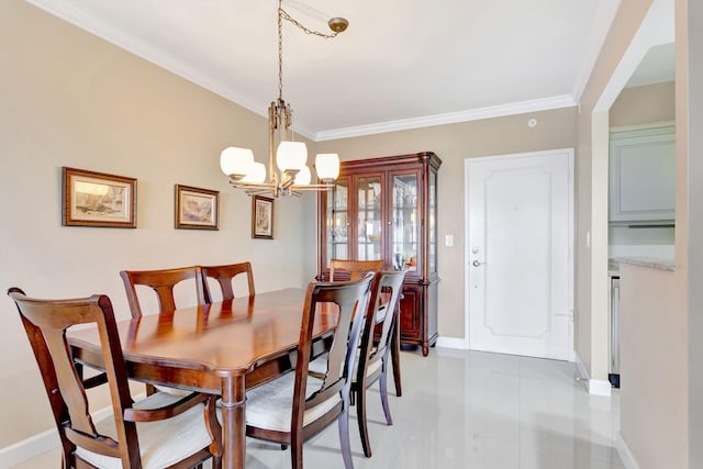 dining space featuring a chandelier, crown molding, and baseboards