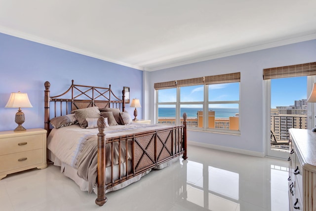 bedroom featuring baseboards, access to exterior, a water view, and ornamental molding