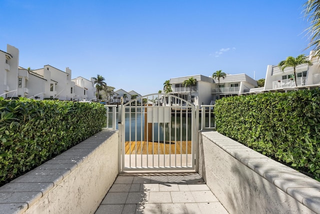 view of gate featuring a residential view